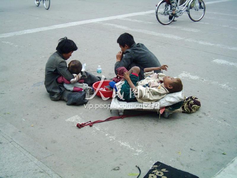 街头乞讨者-人民图片网