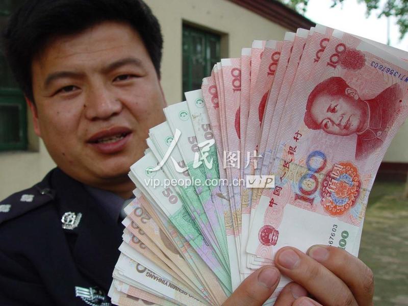 山东莘县警方破获一起购买、使用假币案-人民图片网