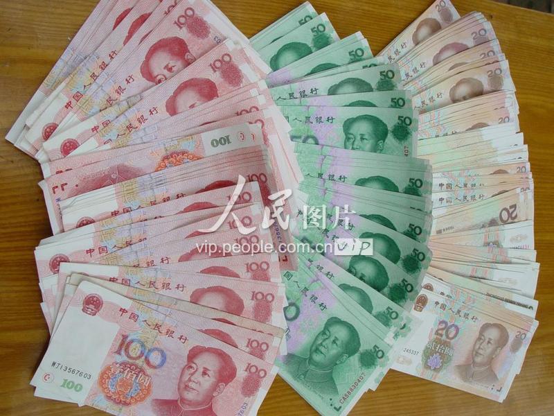 山东莘县警方破获一起购买、使用假币案-人民图片网