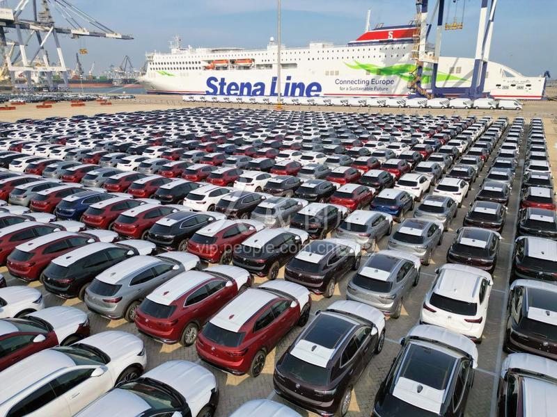 前三季度中國汽車出口超200萬輛(配圖)-人民圖片網