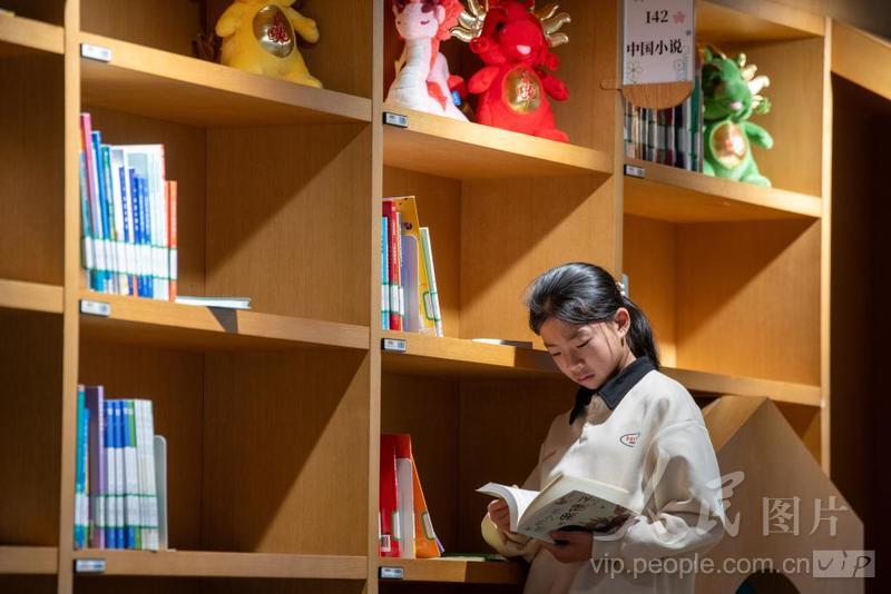 北京:书香伴长假 阅读过大年-人民图片网